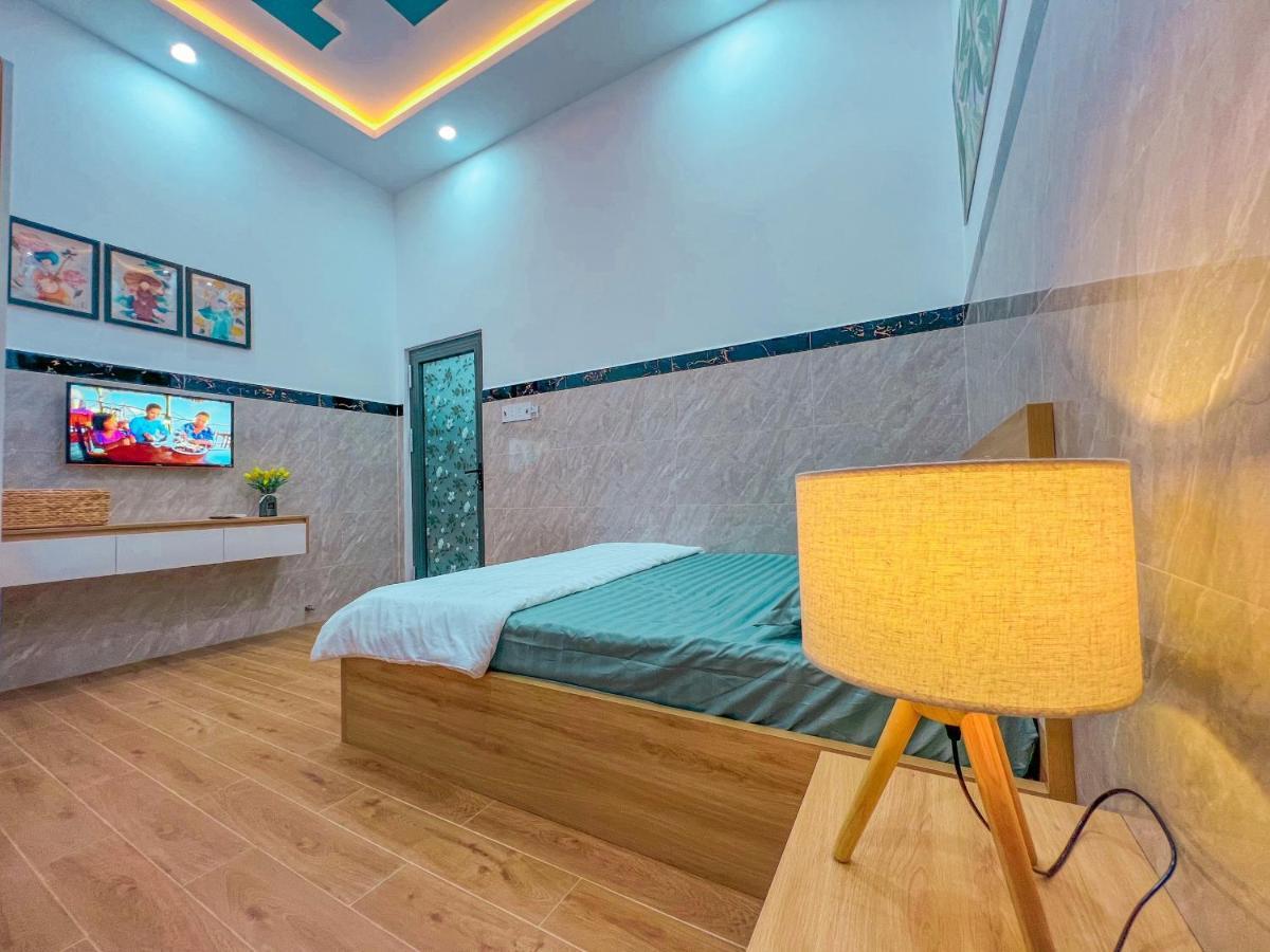 Homestay Qhome Chi Khu Co Ong Extérieur photo
