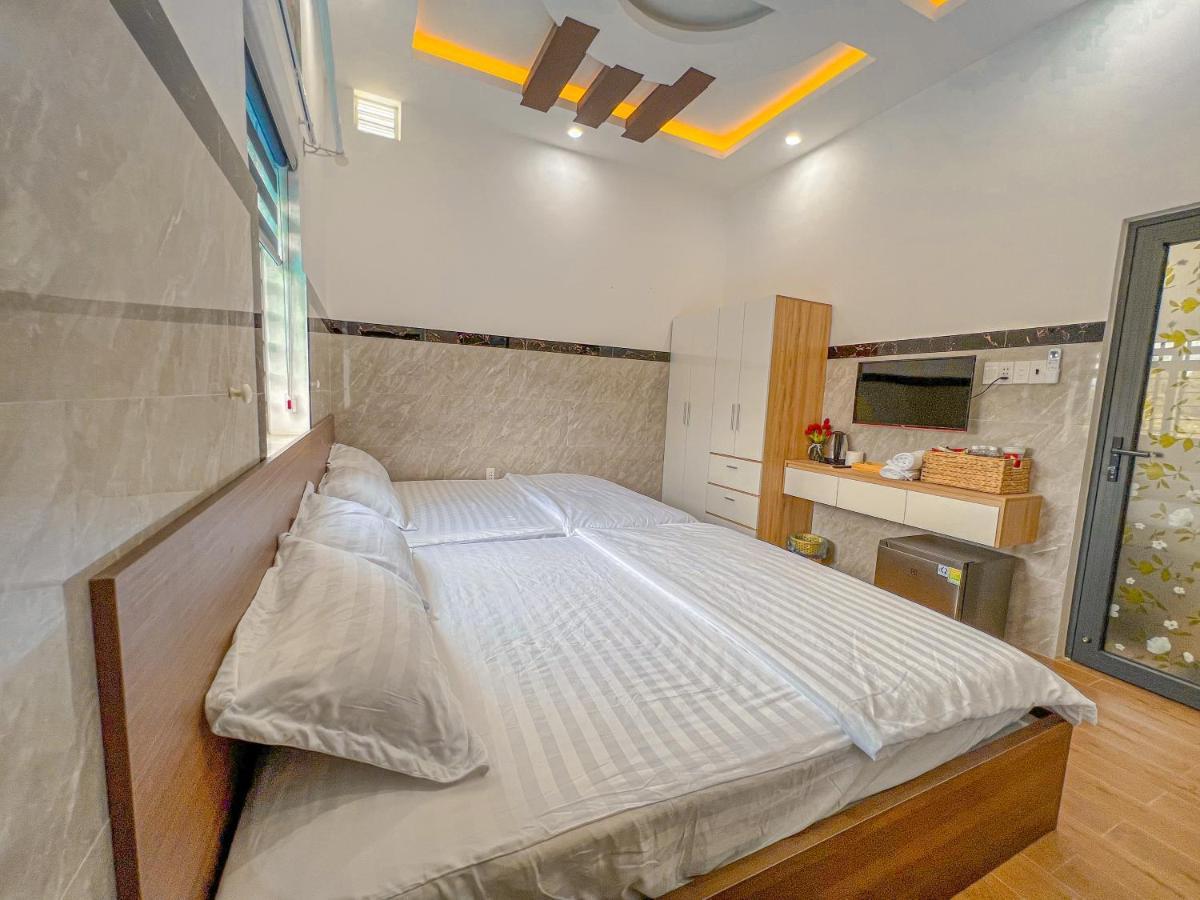 Homestay Qhome Chi Khu Co Ong Extérieur photo